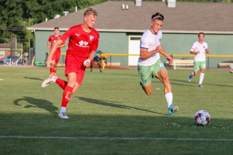 Summer League college soccer players on the field