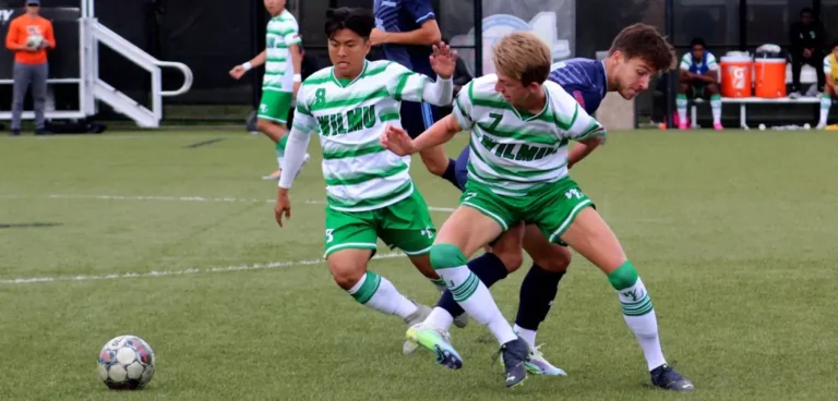 College soccer players at field